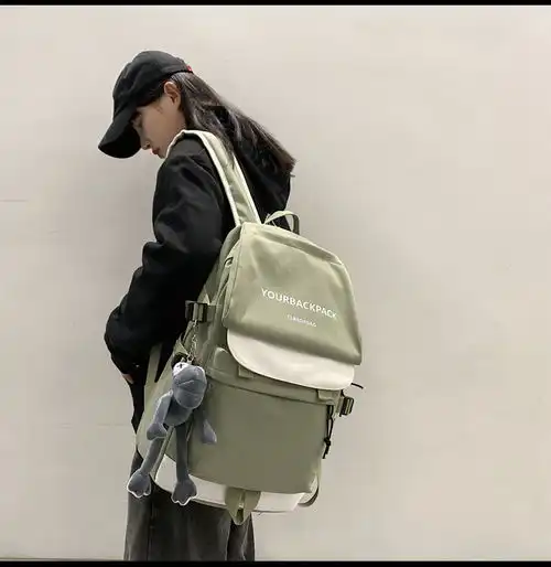 撞色大容量书包男韩版潮高中大学生双肩包女轻便运动初中旅行背包