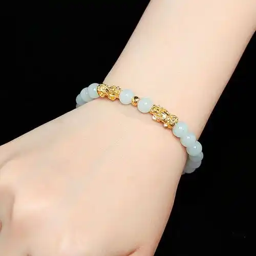 翡翠与黄金转运珠搭配戴法如何巧妙融合手链的转运能量